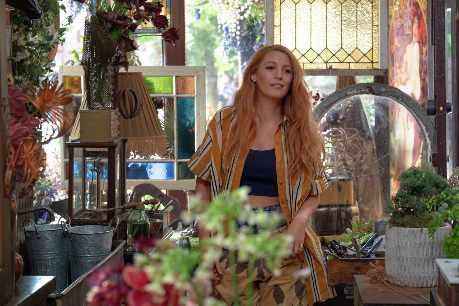 Blake Lively as Lily Bloom inside her flower shop in It Ends with Us